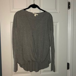 Grey long sleeved high low shirt